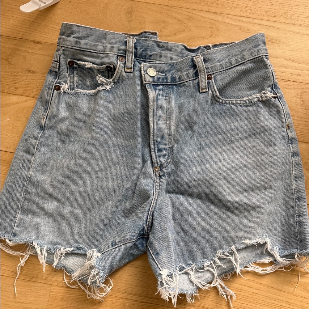 Agolde Light Blue Distressed Cross-Over Jean Shorts